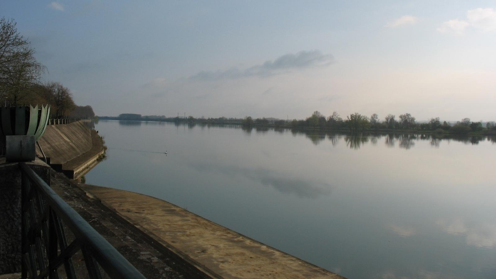 Quiet river landscape seen from a barge cruise in France